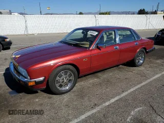 1994 Jaguar XJ with VIN SAJKX1747RC690894, listed as a Copart auction lot 88499345 with 24,006 mi miles and Clean Title. Bid and sale history available at DreamBid. Image 1.