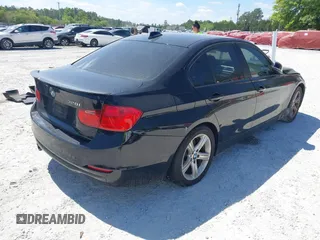 2013 BMW 3 Series 328i with VIN WBA3C1C57DF434854, listed as a IAAI auction lot 42023257 with 125,960 mi miles and . Bid and sale history available at carsss.com. Image 4.