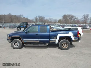1999 Chevrolet Silverado 1500 LT with VIN 1GCEK19T3XE123498, listed as a IAAI auction lot 41801019 with 213,646 mi miles. Bid and sale history available at carsss.com. Image 15.
