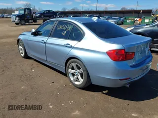 2014 BMW 3 Series 328i with VIN WBA3C1C56EAV79706, listed as a IAAI auction lot 41807033 with 104,478 mi miles. Bid and sale history available at carsss.com. Image 3.