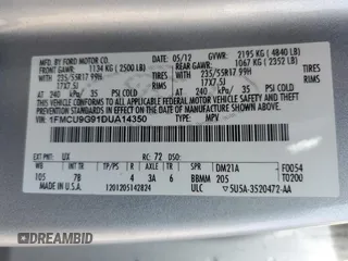 2013 Ford Escape SE with VIN 1FMCU9G91DUA14350, listed as a Copart auction lot 63651315 with 165,414 mi miles and Salvage title. Bid and sale history available at DreamBid. Image 12.