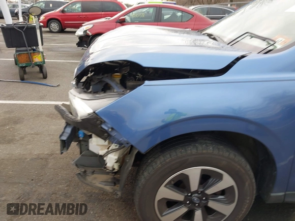 2018 Subaru Forester z VIN JF2SJABC7JH472767, wystawiony jako IAAI lot #40918955 z przebiegiem 72 592 mil mil oraz . Historia ofert i sprzedaży dostępna na DreamBid. Obrazek 6.