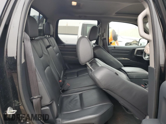 2013 Honda Ridgeline RTL z VIN 5FPYK1F5XDB004190, wystawiony jako Copart lot #58761335 z przebiegiem 56 943 mil mil oraz Czysty tytuł • Clean title. Historia ofert i sprzedaży dostępna na DreamBid. Obrazek 10.