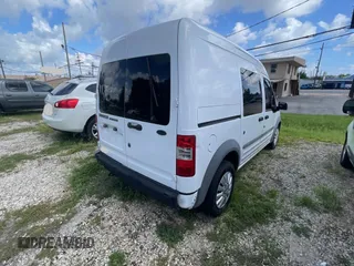 2011 Ford Transit Connect XL with VIN NM0LS6AN0BT051081, listed as a Copart auction lot 64581815 with 185,446 mi miles and Clean title. Bid and sale history available at DreamBid. Image 4.
