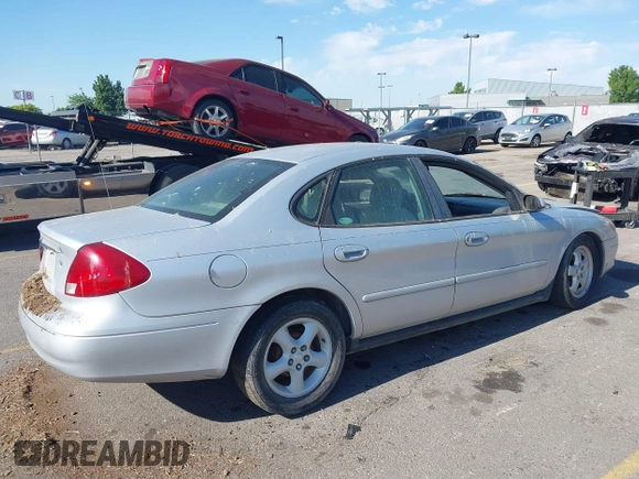2000 Ford Taurus SES with VIN 1FAFP55U1YA246677, listed as a IAAI auction lot 42626261 with 228,669 mi miles and . Bid and sale history available at DreamBid. Image 4.