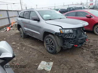 2021 Jeep Grand Cherokee Trailhawk with VIN 1C4RJFLG2MC579884, listed as a IAAI auction lot 41526769 with 115,461 mi miles. Bid and sale history available at carsss.com. Image 1.