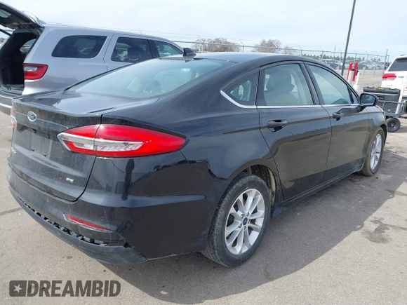 2019 Ford Fusion SE with VIN 3FA6P0H71KR255482, listed as a IAAI auction lot 41890864 with 125,077 mi miles. Bid and sale history available at carsss.com. Image 4.