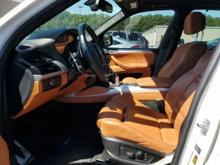 2011 BMW X5 M with VIN 5YMGY0C57BLK26432, listed as a Copart auction lot 67023344 with 74,800 mi miles and Salvage Title. Bid and sale history available at carsss.com. Image 7.
