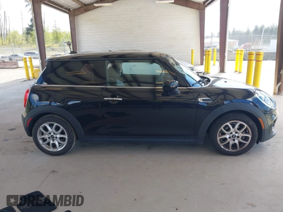 2021 MINI Hardtop Cooper with VIN WMWXR3C0XM2N93195, listed as a IAAI auction lot 42083421 with 46,269 mi miles and . Bid and sale history available at DreamBid. Image 13.