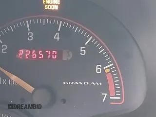 2005 Pontiac Grand Am SE with VIN 1G2NE52E55M157668, listed as a IAAI auction lot 41618857 with 226,570 mi miles. Bid and sale history available at carsss.com. Image 12.