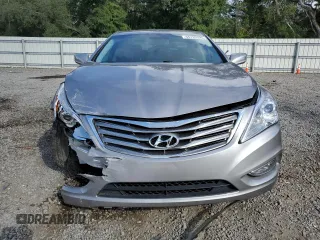 2013 Hyundai Azera z VIN KMHFG4JG3DA209396, wystawiony jako Copart lot #55789595 z przebiegiem 154 665 mil mil oraz Szkoda całkowita • Salvage title. Historia ofert i sprzedaży dostępna na DreamBid. Obrazek 5.
