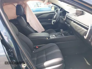 2024 Mazda CX-50 S Premium with VIN 7MMVABDM4RN157011, listed as a IAAI auction lot 42300111 with 39,863 mi miles and . Bid and sale history available at DreamBid. Image 5.