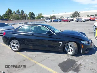 2015 BMW 4 Series 428i z VIN WBA3V7C53FP772066, wystawiony jako IAAI lot #42837150 z przebiegiem Nie podano mil oraz . Historia ofert i sprzedaży dostępna na DreamBid. Obrazek 14.