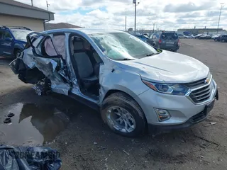 2018 Chevrolet Equinox LT z VIN 3GNAXSEV0JL133384, wystawiony jako IAAI lot #42314759 z przebiegiem 51 430 mil mil oraz . Historia ofert i sprzedaży dostępna na DreamBid. Obrazek 1.