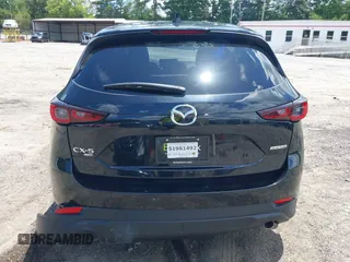 2023 Mazda CX-5 S Carbon Edition z VIN JM3KFBCMXP0201665, wystawiony jako IAAI lot #39965378 z przebiegiem 29 105 mil mil oraz . Historia ofert i sprzedaży dostępna na DreamBid. Obrazek 16.