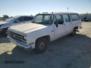 1990 Chevrolet Suburban with VIN 1GNER16K4LF170705, listed as a Copart auction lot 75886154 with 223,077 mi miles and Clean Title. Bid and sale history available at carsss.com. Image 1.