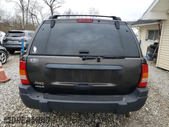 2004 Jeep Grand Cherokee Laredo with VIN 1J4GW48S94C431302, listed as a Copart auction lot 53433245 with 137,690 mi miles and Salvage Title. Bid and sale history available at carsss.com. Image 6.