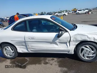 2000 Ford Escort ZX2 z VIN 3FAKP1134YR161407, wystawiony jako IAAI lot #42199401 z przebiegiem 150 611 mil mil oraz . Historia ofert i sprzedaży dostępna na DreamBid. Obrazek 13.