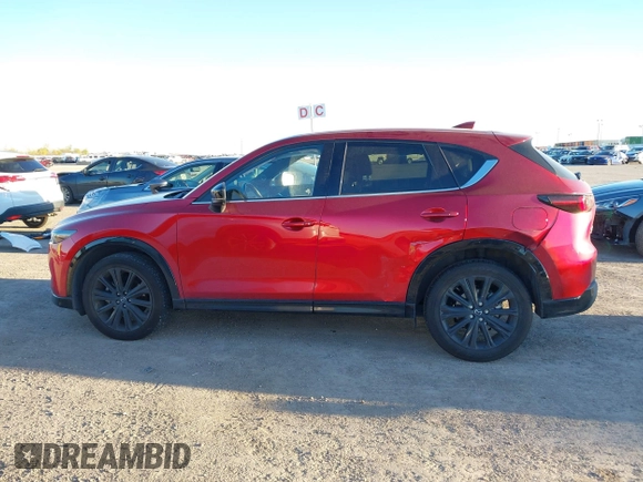 2022 Mazda CX-5 2.5 Turbo with VIN JM3KFBAY4N0564000, listed as a IAAI auction lot 41076013 with 25,106 mi miles and . Bid and sale history available at carsss.com. Image 14.