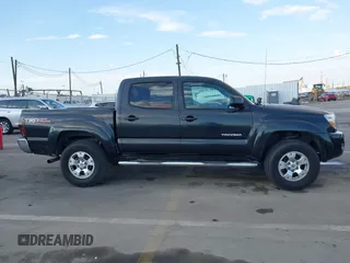 2008 Toyota Tacoma PreRunner with VIN 3TMJU62N88M058614, listed as a IAAI auction lot 41442510 with 140,973 mi miles. Bid and sale history available at carsss.com. Image 14.