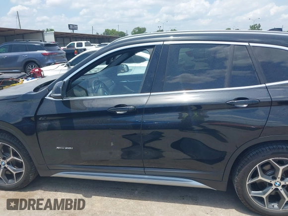 2017 BMW X1 xDrive28i with VIN WBXHT3Z30H4A65417, listed as a IAAI auction lot 42328797 with 103,788 mi miles and . Bid and sale history available at DreamBid. Image 14.