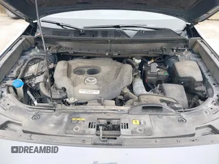 2021 Mazda CX-9 Grand Touring with VIN JM3TCBDY9M0534966, listed as a IAAI auction lot 42166071 with 77,817 mi miles and . Bid and sale history available at DreamBid. Image 10.