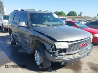 2005 GMC Yukon Denali z VIN 1GKEK63U15J105282, wystawiony jako IAAI lot #42031144 z przebiegiem 214 703 mil mil oraz . Historia ofert i sprzedaży dostępna na DreamBid. Obrazek 1.