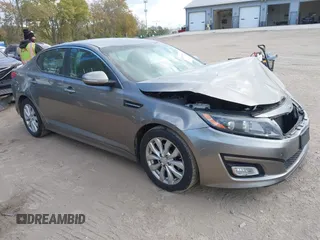 2015 Kia Optima LX with VIN 5XXGM4A74FG469881, listed as a IAAI auction lot 40592058 with 193,093 mi miles and . Bid and sale history available at DreamBid. Image 1.