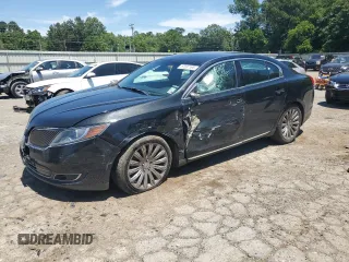 2015 Lincoln MKS with VIN 1LNHL9DK8FG605048, listed as a Copart auction lot 57597195 with 134,695 mi miles and Salvage title. Bid and sale history available at DreamBid. Image 1.