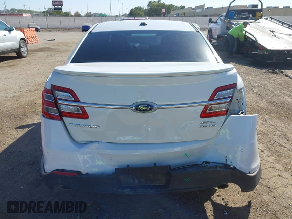 2016 Ford Taurus SEL with VIN 1FAHP2E84GG102031, listed as a IAAI auction lot 40597227 with 167,410 mi miles and . Bid and sale history available at DreamBid. Image 16.