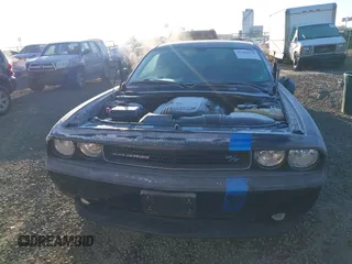 2013 Dodge Challenger R/T z VIN 2C3CDYBT1DH501055, wystawiony jako IAAI lot #41424579 z przebiegiem 156 492 mil mil oraz . Historia ofert i sprzedaży dostępna na DreamBid. Obrazek 12.