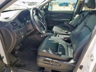 2020 Honda Pilot Touring 7-Passenger with VIN 5FNYF6H69LB018905, listed as a Copart auction lot 61209685 with 61,637 mi miles and Salvage title. Bid and sale history available at DreamBid. Image 7.