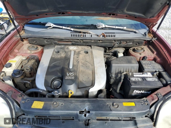 2005 Hyundai Santa Fe GLS z VIN KM8SC13E25U975169, wystawiony jako Copart lot #42533125 z przebiegiem 318 223 mil mil oraz Szkoda całkowita • Salvage title. Historia ofert i sprzedaży dostępna na DreamBid. Obrazek 12.