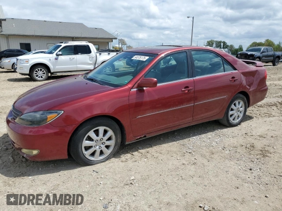2003 Toyota Camry LE z VIN JTDBF30K530091667, wystawiony jako Copart lot #54576175 z przebiegiem 230 772 mil mil oraz Czysty tytuł • Clean title. Historia ofert i sprzedaży dostępna na DreamBid. Obrazek 1.