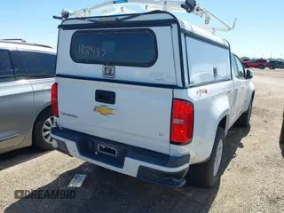 2019 Chevrolet Colorado 4WD LT with VIN 1GCHTCEA8K1124639, listed as a IAAI auction lot 42188497 with 84,799 mi miles and . Bid and sale history available at DreamBid. Image 4.