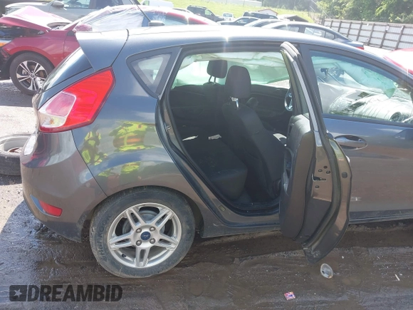 2019 Ford Fiesta SE z VIN 3FADP4EJ9KM125252, wystawiony jako IAAI lot #42221622 z przebiegiem 57 366 mil mil oraz . Historia ofert i sprzedaży dostępna na DreamBid. Obrazek 8.