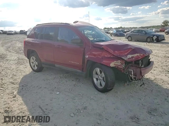 2011 Jeep Compass with VIN 1J4NT1FB4BD194839, listed as a Copart auction lot 73001014 with 113,050 mi miles and Salvage Title. Bid and sale history available at carsss.com. Image 11.