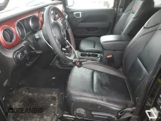 2023 Jeep Gladiator Rubicon with VIN 1C6JJTBG7PL573197, listed as a Copart auction lot 53866075 with 19,521 mi miles and Salvage title. Bid and sale history available at DreamBid. Image 7.