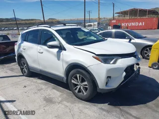2016 Toyota RAV4 XLE with VIN JTMWFREV5GJ098870, listed as a IAAI auction lot 41878605 with 109,996 mi miles. Bid and sale history available at carsss.com. Image 1.