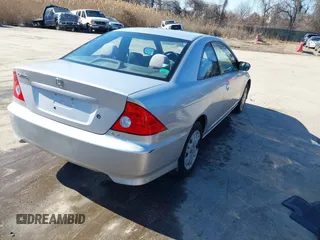 2004 Honda Civic LX with VIN 1HGEM22524L022246, listed as a IAAI auction lot 41589224 with 149,188 mi miles. Bid and sale history available at carsss.com. Image 4.
