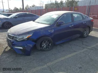 2019 Kia Optima LX with VIN 5XXGT4L36KG344839, listed as a IAAI auction lot 41399595 with 71,007 mi miles. Bid and sale history available at carsss.com. Image 2.