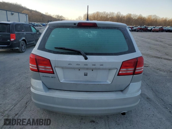 2013 Dodge Journey American Value with VIN 3C4PDCAB9DT604157, listed as a Copart auction lot 48206675 with 158,392 mi miles and Salvage Title. Bid and sale history available at DreamBid. Image 6.