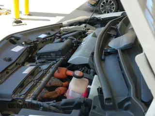 2015 Toyota Prius Two z VIN JTDZN3EU0FJ036313, wystawiony jako IAAI lot #42640851 z przebiegiem 118 674 mil mil oraz . Historia ofert i sprzedaży dostępna na DreamBid. Obrazek 19.