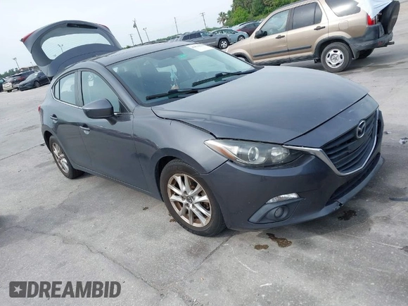 2015 Mazda 3 i Touring with VIN JM1BM1L79F1218498, listed as a IAAI auction lot 41876820 with 87,602 mi miles and . Bid and sale history available at carsss.com. Image 1.