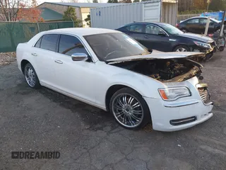 2013 Chrysler 300 with VIN 2C3CCAAGXDH530021, listed as a IAAI auction lot 40848993 with 1 mi miles. Bid and sale history available at carsss.com. Image 1.