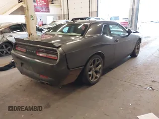 2015 Dodge Challenger R/T with VIN 2C3CDZAT5FH794310, listed as a IAAI auction lot 41725179 with 84,961 mi miles and . Bid and sale history available at DreamBid. Image 4.