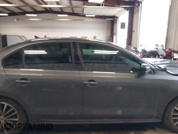 2016 Volkswagen Jetta Sport z VIN 3VWD17AJ8GM410208, wystawiony jako IAAI lot #42237019 z przebiegiem 67 137 mil mil oraz . Historia ofert i sprzedaży dostępna na DreamBid. Obrazek 13.