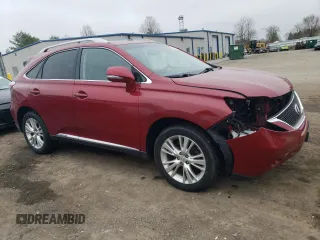 2010 Lexus RX 450h with VIN JTJBC1BAXA2007326, listed as a Copart auction lot 52575415 with 228,316 mi miles and Salvage Title. Bid and sale history available at DreamBid. Image 4.