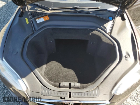 2013 Tesla Model S Performance z VIN 5YJSA1CP1DFP20208, wystawiony jako Copart lot #56066035 z przebiegiem 71 513 mil mil oraz Szkoda całkowita • Salvage title. Historia ofert i sprzedaży dostępna na DreamBid. Obrazek 11.