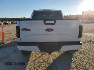 2015 Ford F-150 XLT with VIN 1FTEW1EP9FFC91698, listed as a Copart auction lot 87816535 with 127,459 mi miles and Salvage Title. Bid and sale history available at DreamBid. Image 6.